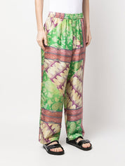 Aries Paisley-Print Silk Trousers Far Front Side View