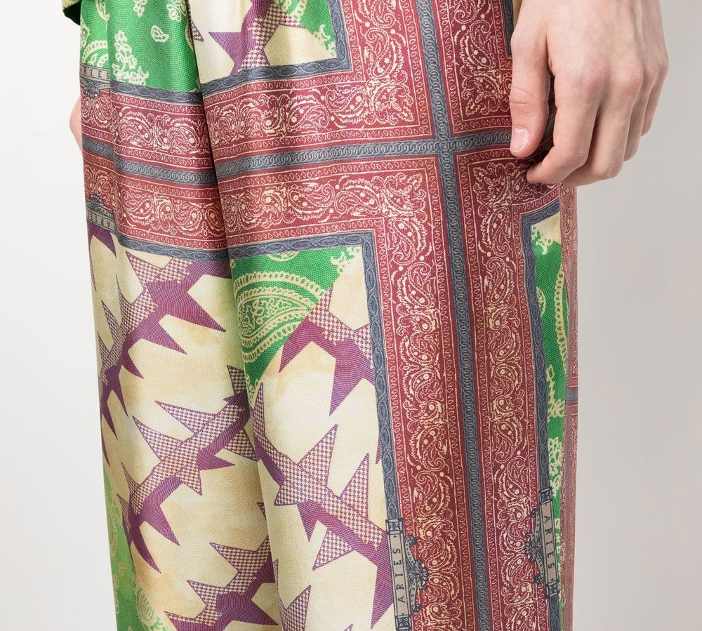 Aries Paisley-Print Silk Trousers Front Side View
